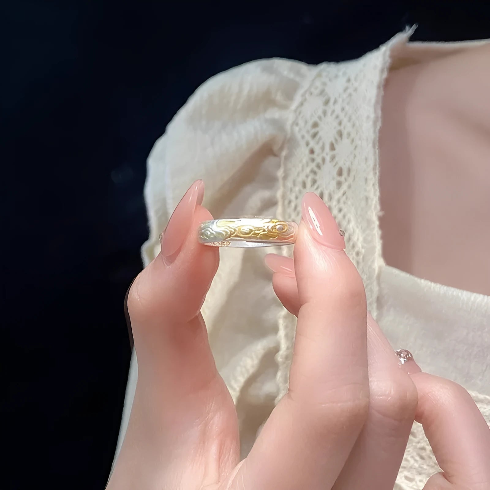 White copper open mouth ring with Xiangyun pattern and silver gold electroplated finish.