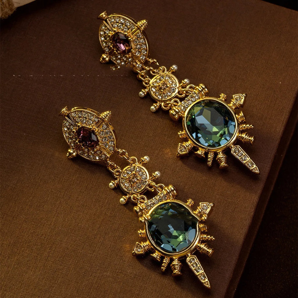 Gold geometric retro stud earrings with diamond finish on alloy material