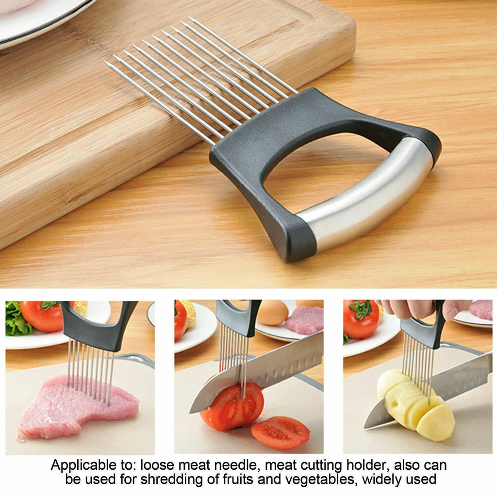 Stainless steel onion holder slicer with non-slip base on a kitchen counter next to a tomato and knife