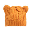 Red handmade knitted wool beanie hat with 3D cat ears on a white background