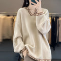 Women's camel colour v-neck viscose sweater with regular long sleeves on hanger