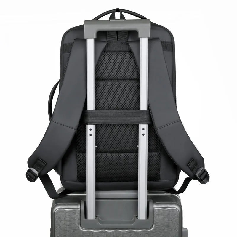 Large capacity black backpack for business travel and outdoor use with curved shoulder straps