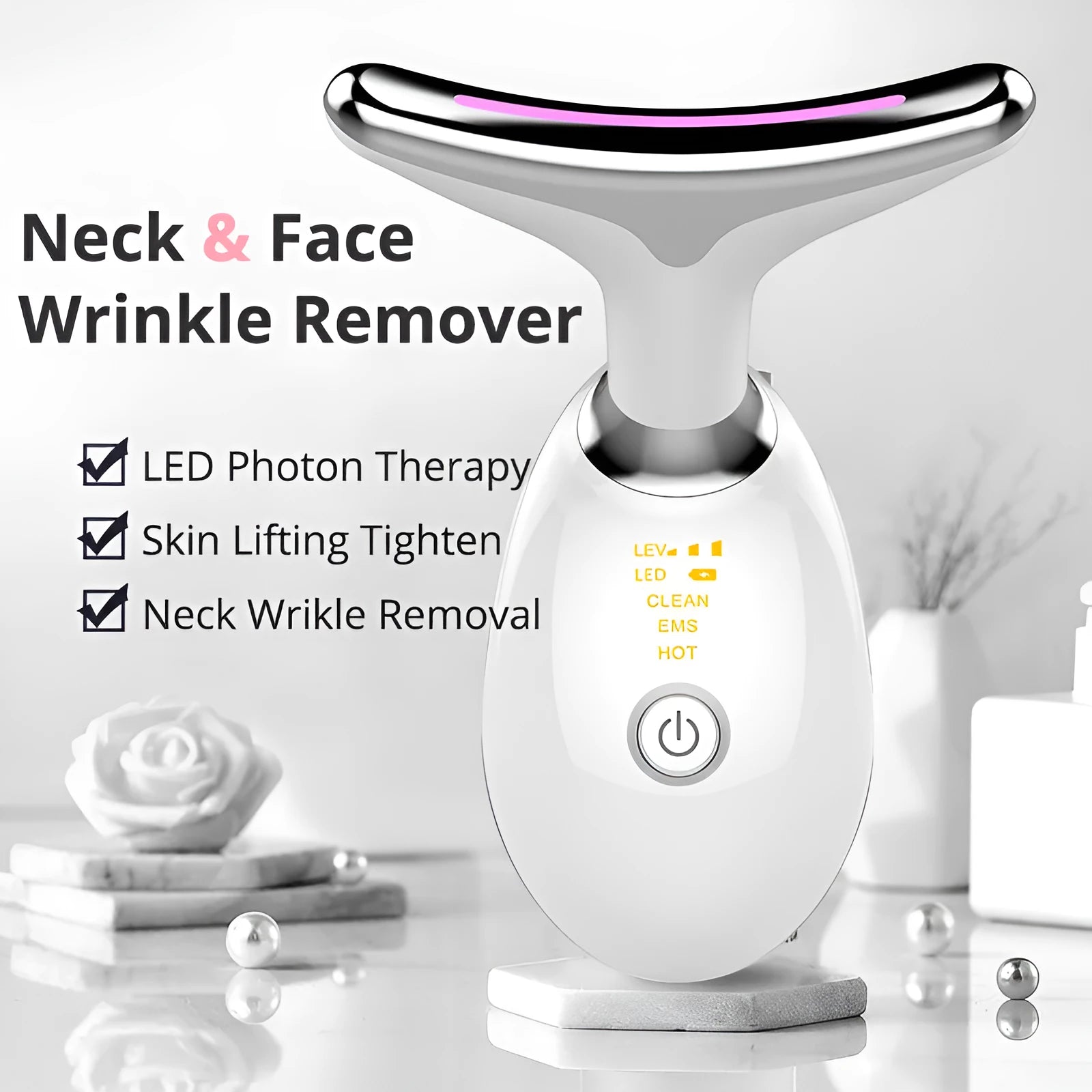 White EMS thermal neck massager device with LED lights and a USB charging cable.