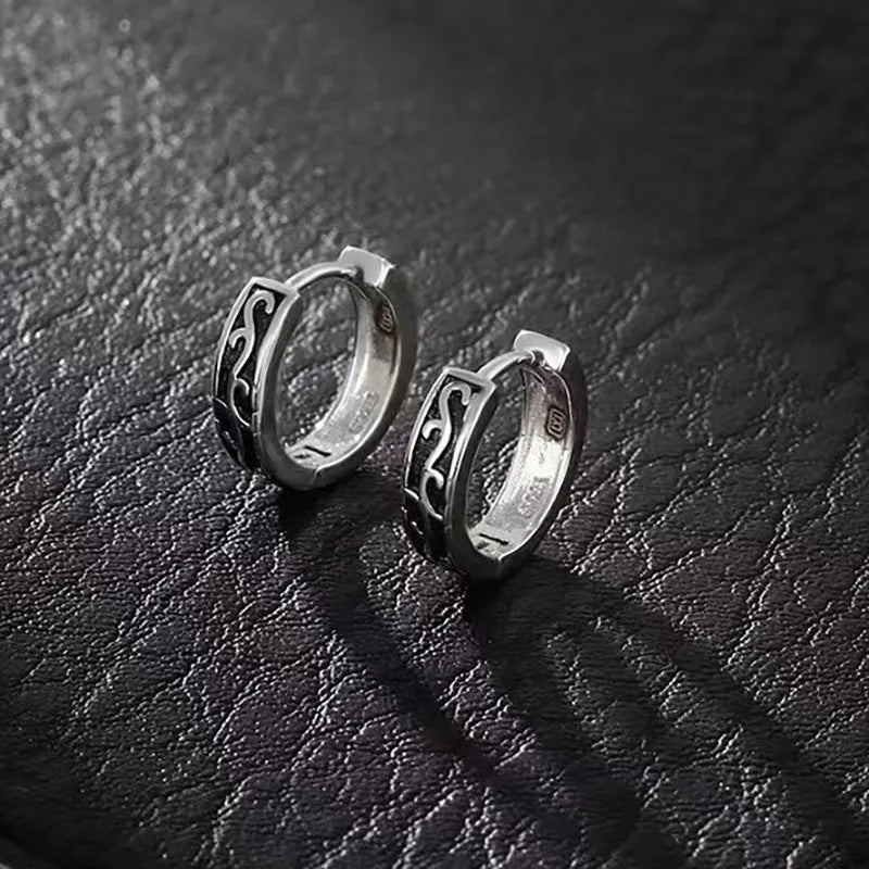 Simple geometric men's silver-tone earrings on a plain background showing front and side views.