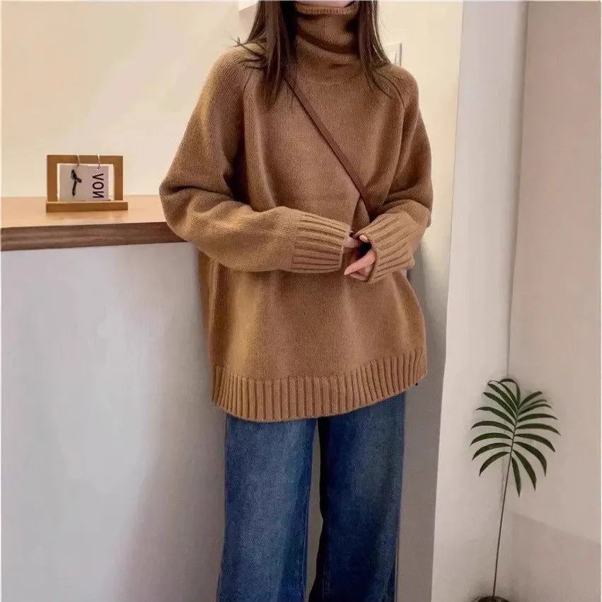 Women's thick loose turtleneck sweater with curling collar and 3D pattern in camel colour.