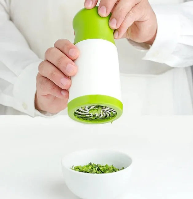 Herb grinder spice mill in white plastic with stainless steel blade and removable top for fresh herbs