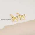 Women's electroplated zinc alloy bow and cross stud earrings in gold and silver, geometric shape.