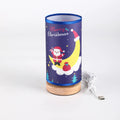 Moon Santa Claus design LED night light with bamboo base and USB plug.