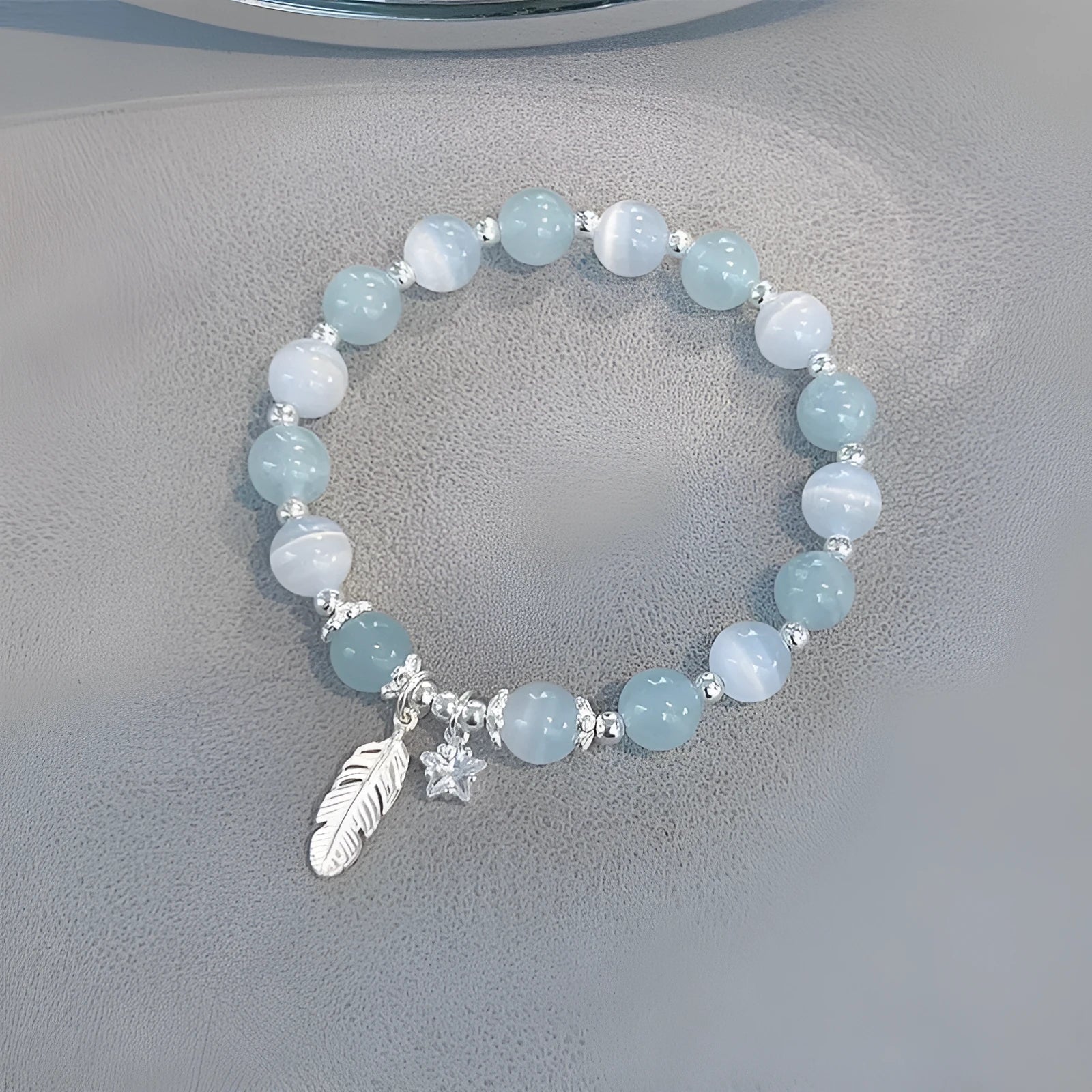 Small white girl crystal bracelet in Feather XINGX Blue Moonlight with eight Awn star and text design