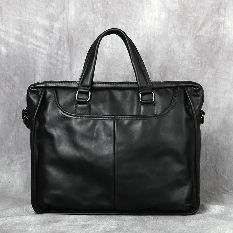 Black men's leather leisure briefcase with top layer cow hide, zipper closure, and shoulder strap