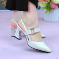 Women's apricot leather closed toe backless sandals with a chunky high heel on a white background.