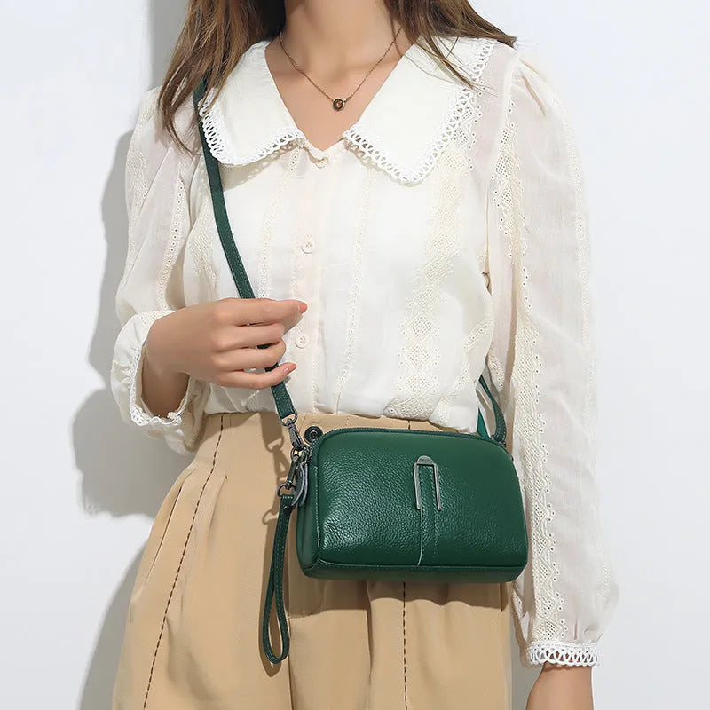 Genuine leather ladies shoulder bag in urban simplicity style, horizontal square shape, compact 19x13x6cm size.