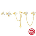 Golden S925 sterling silver earrings with zircon inlay in geometric, clover, crown, and chain styles.