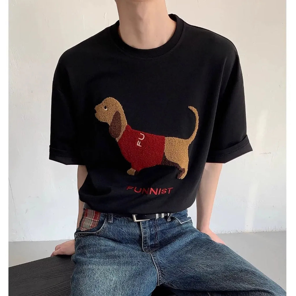 Grey men's cotton t-shirt with embroidered dachshund dog holding a towel graphic.