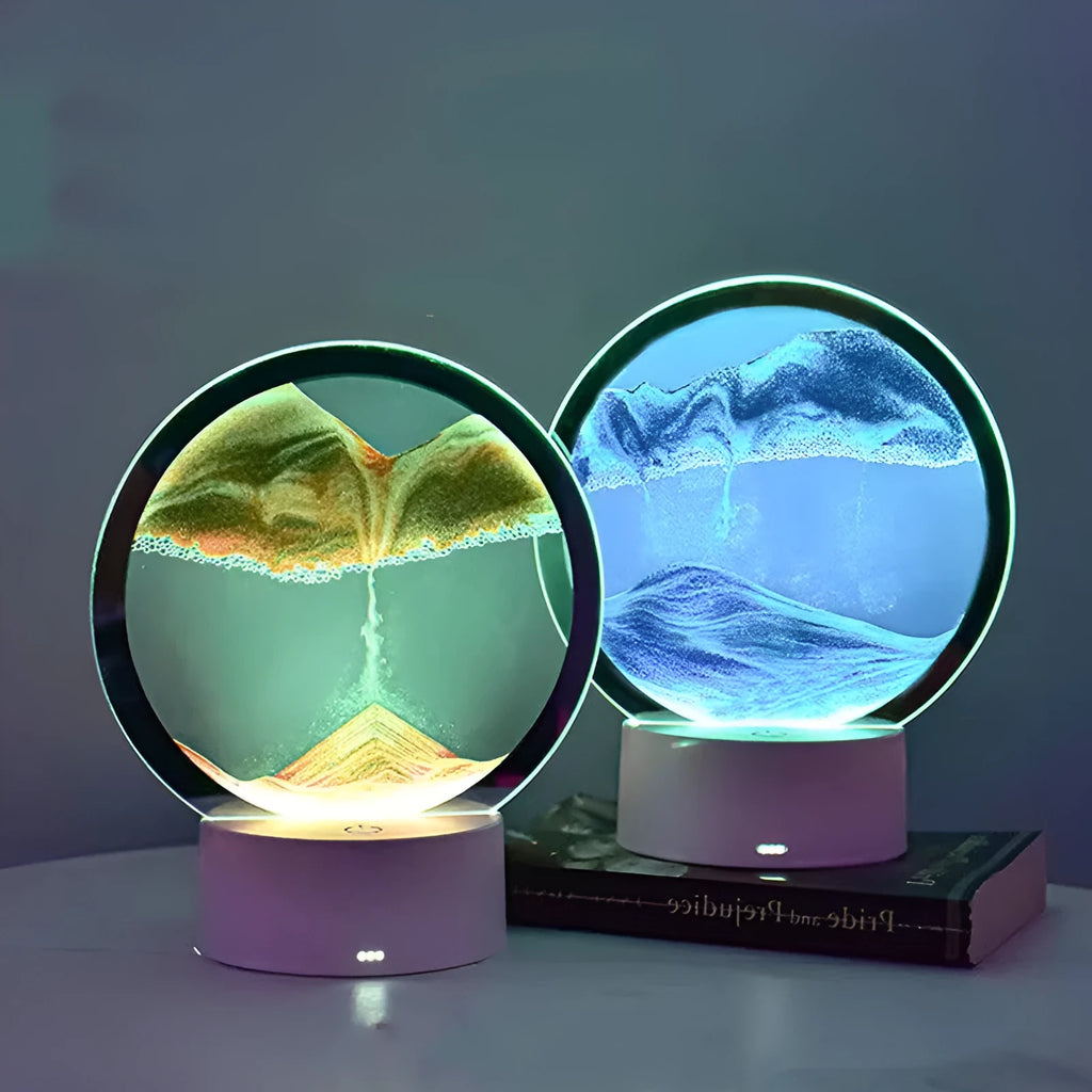 Creative 3D quicksand table lamp with glass shade on bedside table showing blue light colour