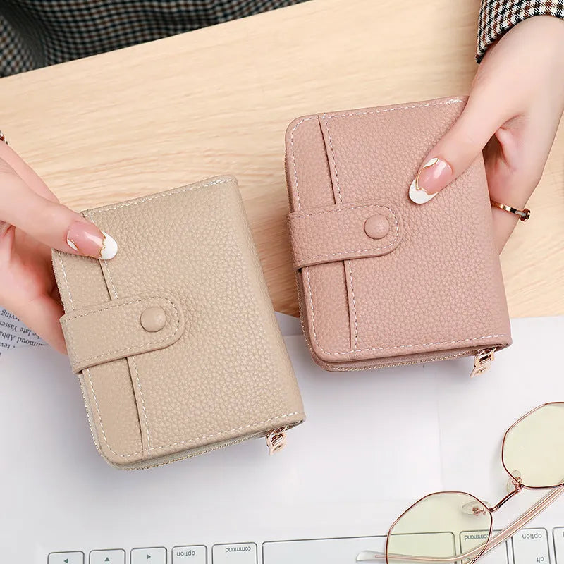 Ladies' short wallet with lychee pattern in two-fold design showing colour options