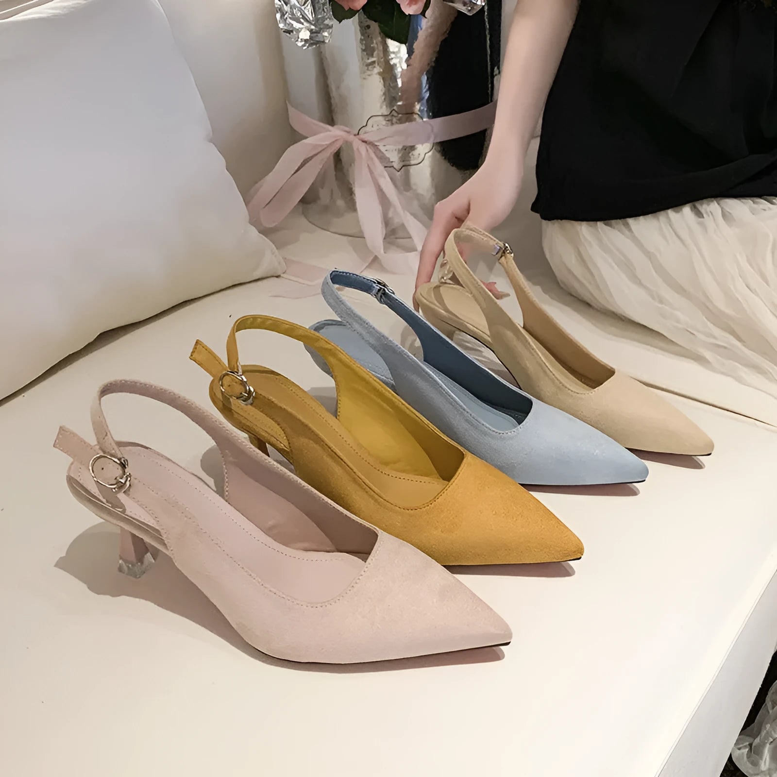 Suede pointed stiletto high heels in pink with a slim heel and microfiber lining