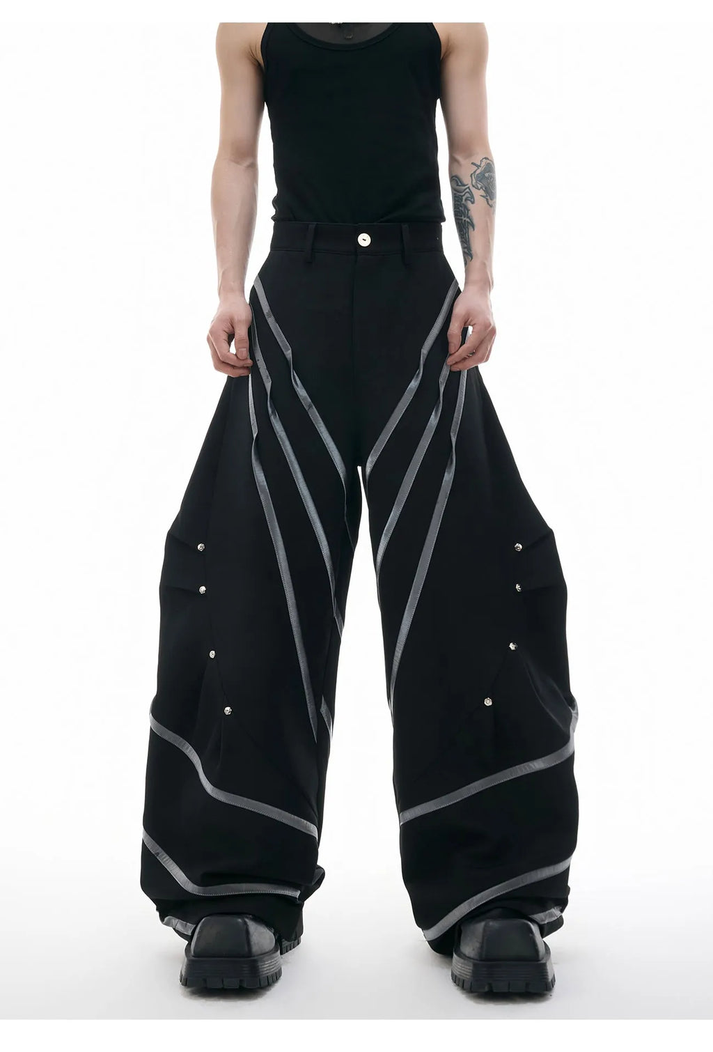 Men's polyester trousers with three-dimensional cutting and metal rivet pleated detailing