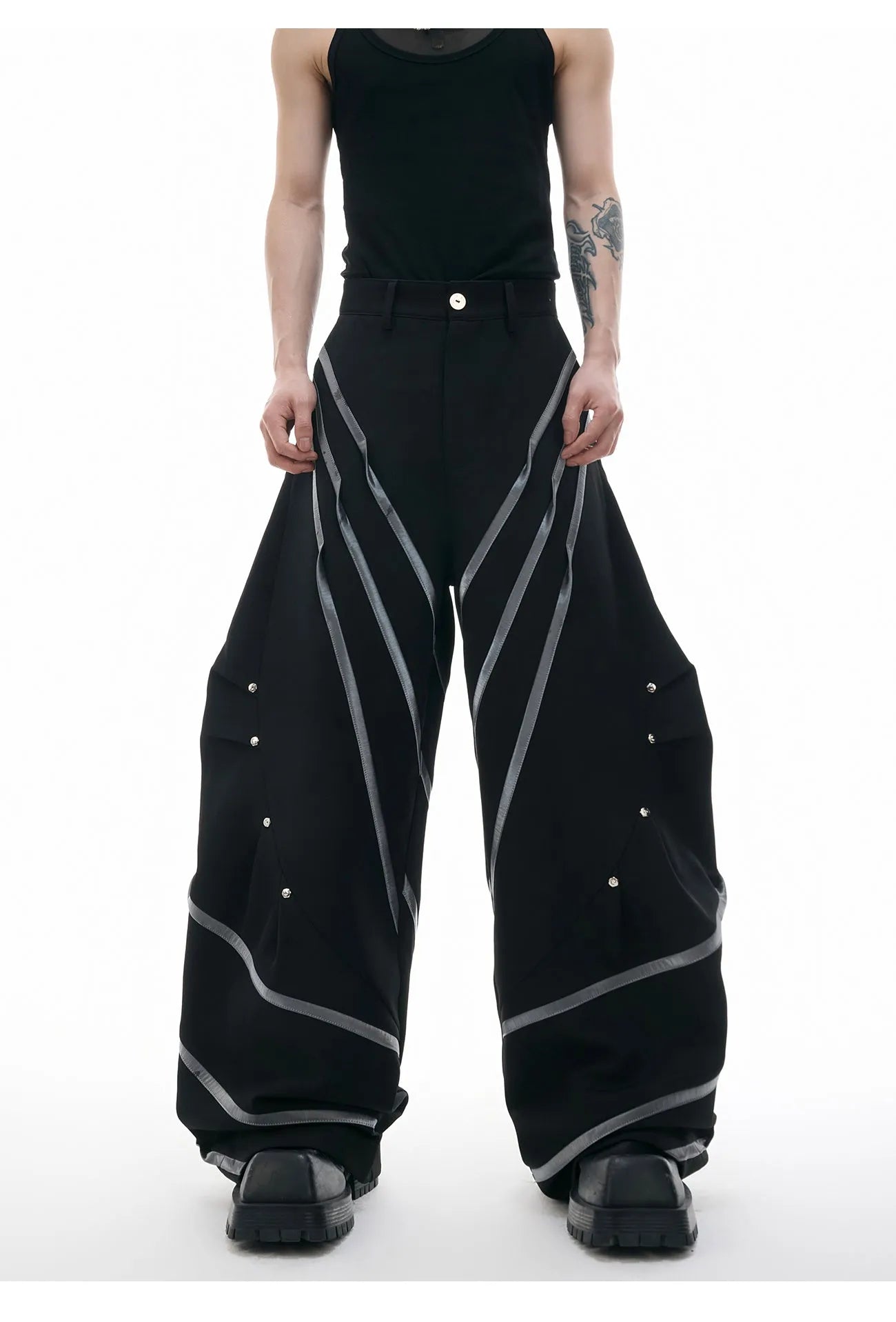 Men's polyester trousers with three-dimensional cutting and metal rivet pleated detailing