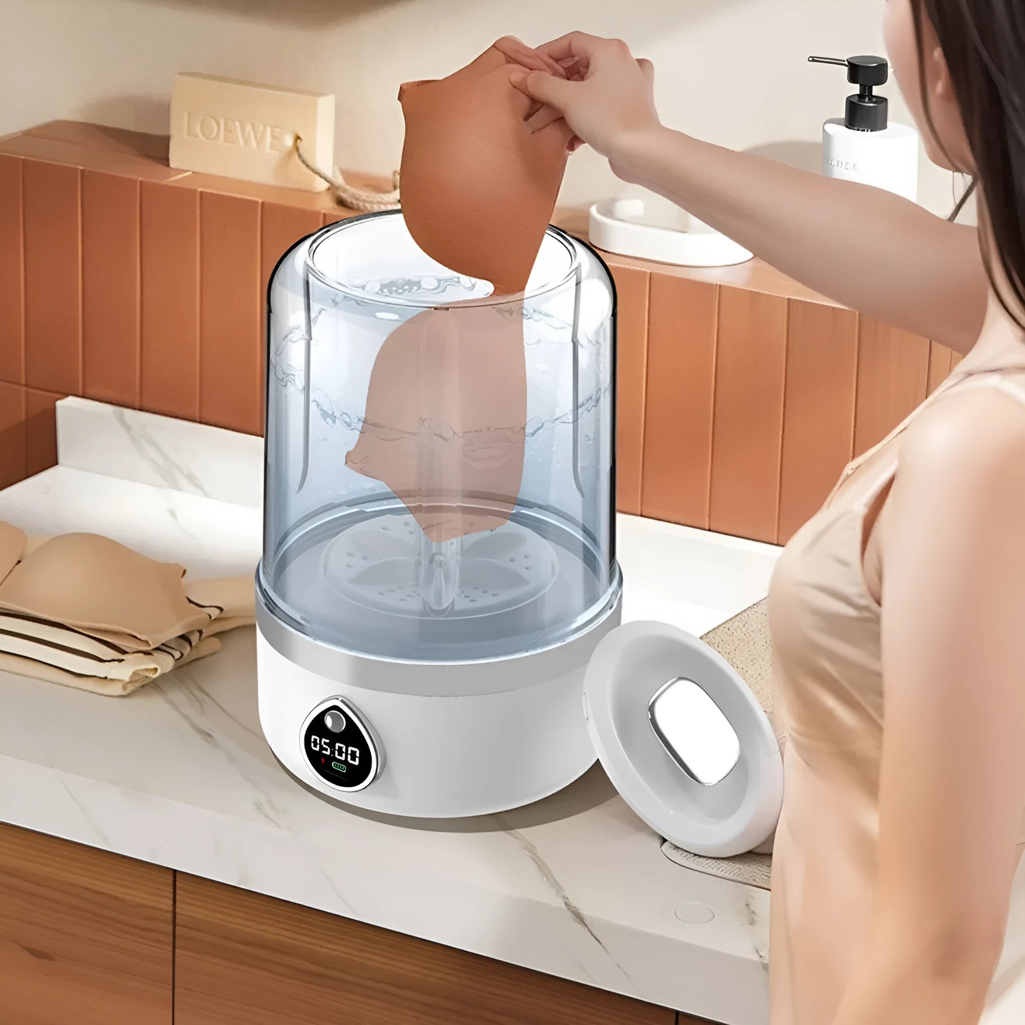 White portable mini washing machine with USB charging cable showing compact dimensions