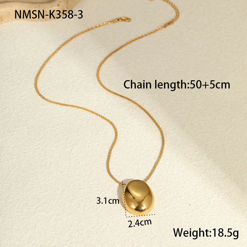 Gold geometric pendant necklace on adjustable chain with stainless steel construction
