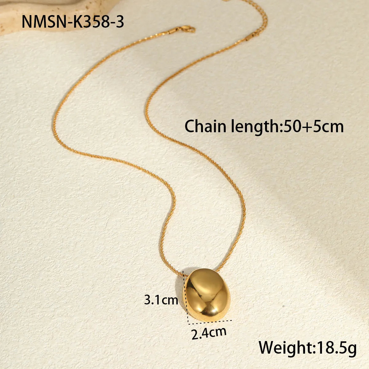 Gold geometric pendant necklace on adjustable chain with stainless steel construction