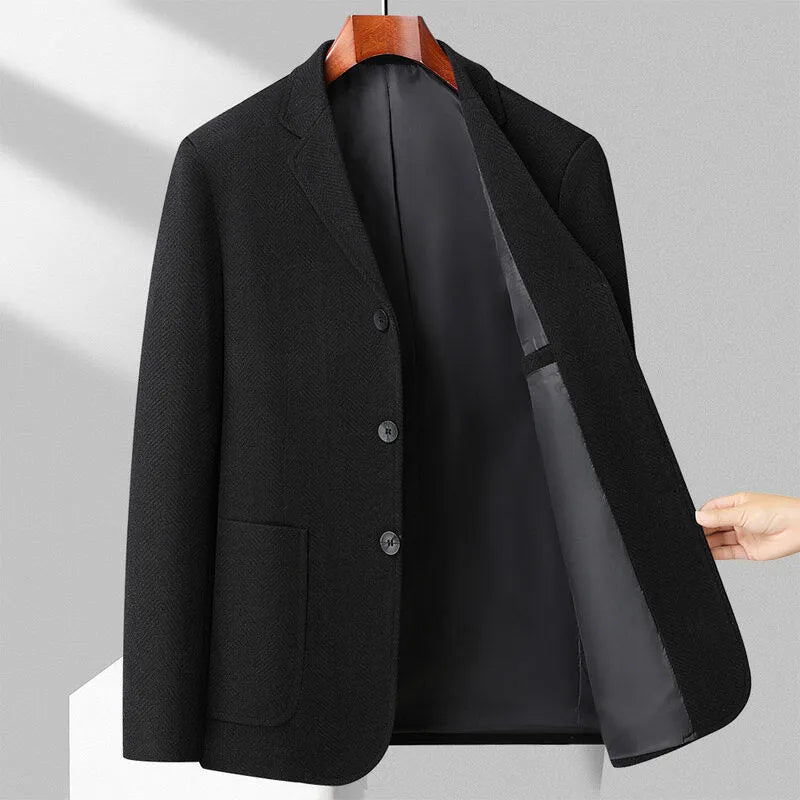 Man wearing a classic loose-fit solid colour woolen coat for spring or autumn.