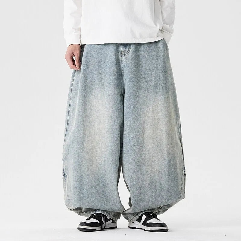 Men's plus size baggy jeans in light blue cotton denim with wide leg straight cut