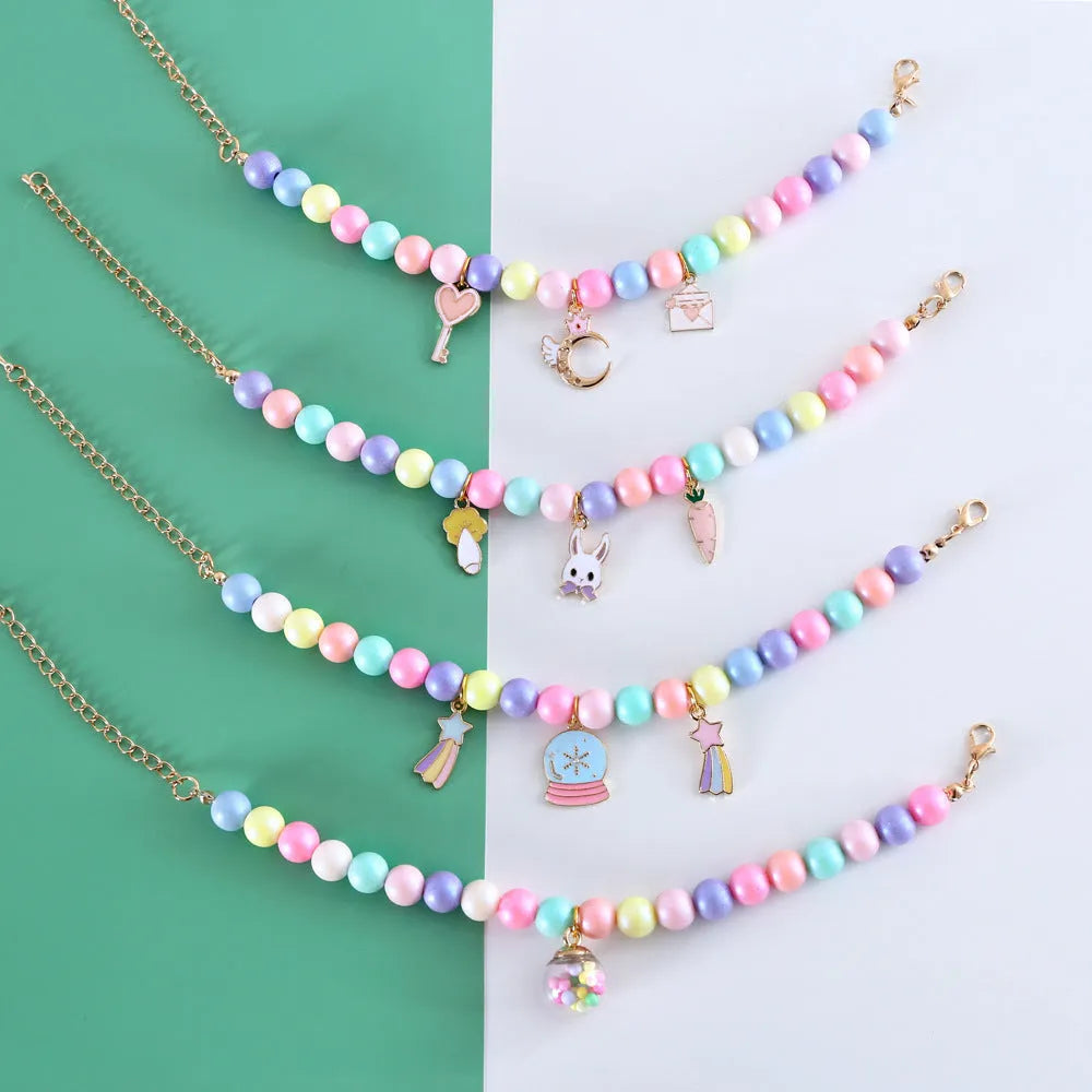 Resin adjustable pet collar with macaron charm in six designs including moon, meteor, rabbit, crystal ball, crown and girl