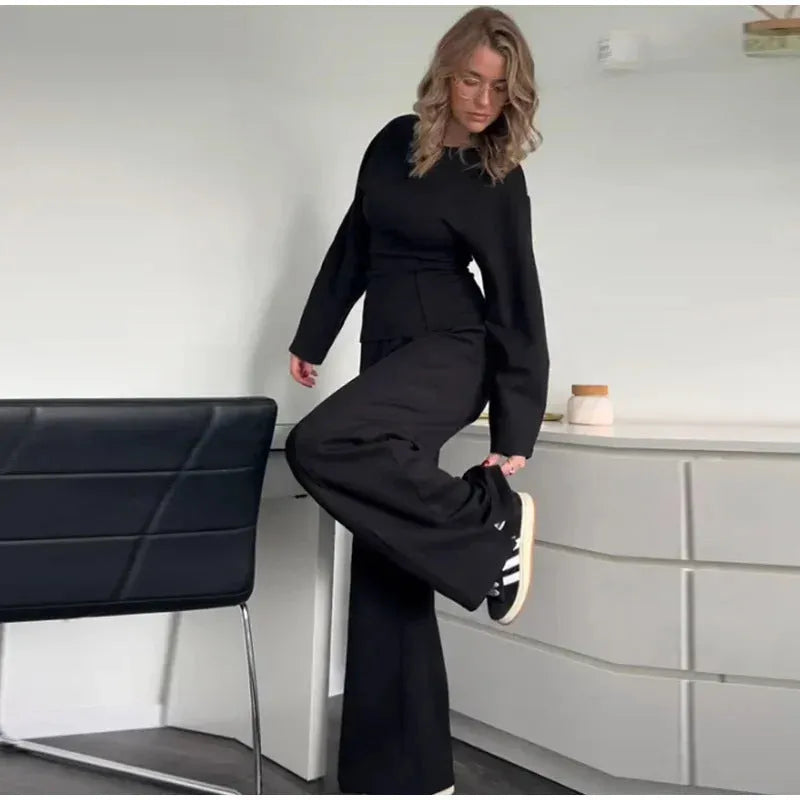 Women's polar fleece suit set showing long sleeve O-neck top with wide leg trousers in multiple colour options