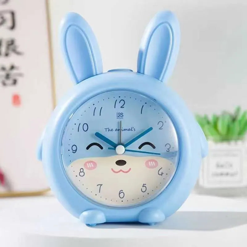 Children's cartoon alarm clock with singing function and mute button in blue or pink colours