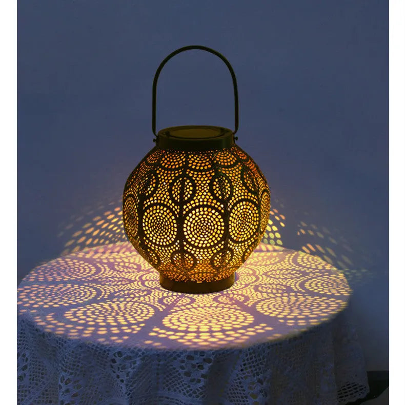 Solar outdoor courtyard hollow decorative iron portable lamp with warm white LED light