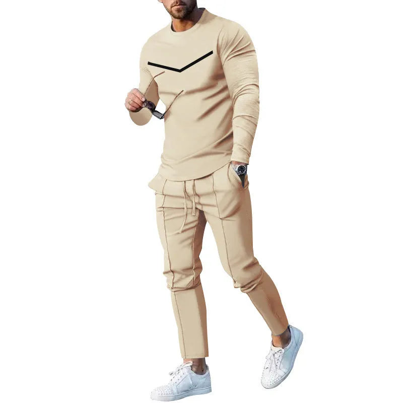 Men's cotton blend round neck long sleeve T-shirt and trousers tracksuit set in light gray on a plain background