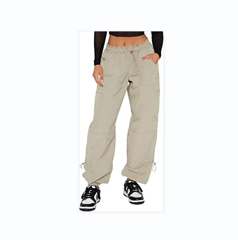 Loose-fit straight-leg cargo casual pants in grey with multiple pockets, shown on a hanger.