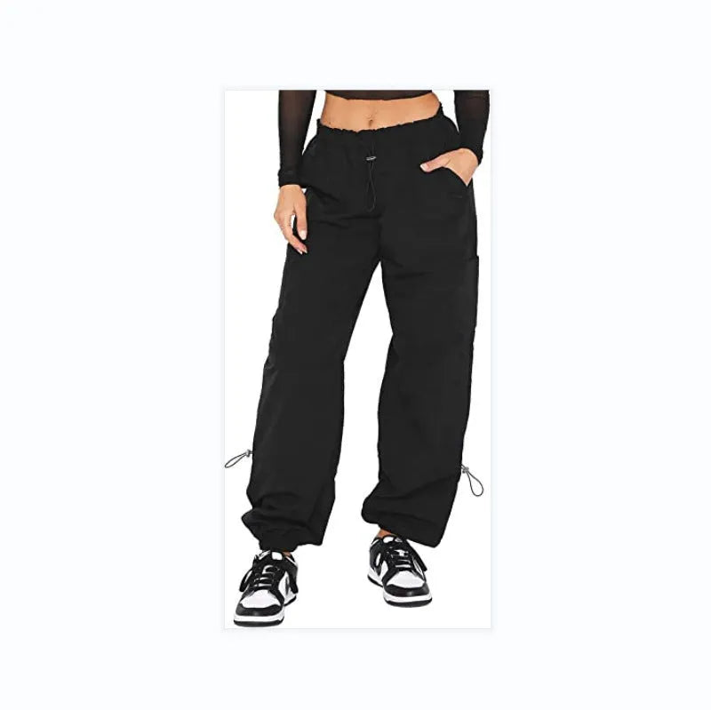 Loose-fit straight-leg cargo casual pants in grey with multiple pockets, shown on a hanger.