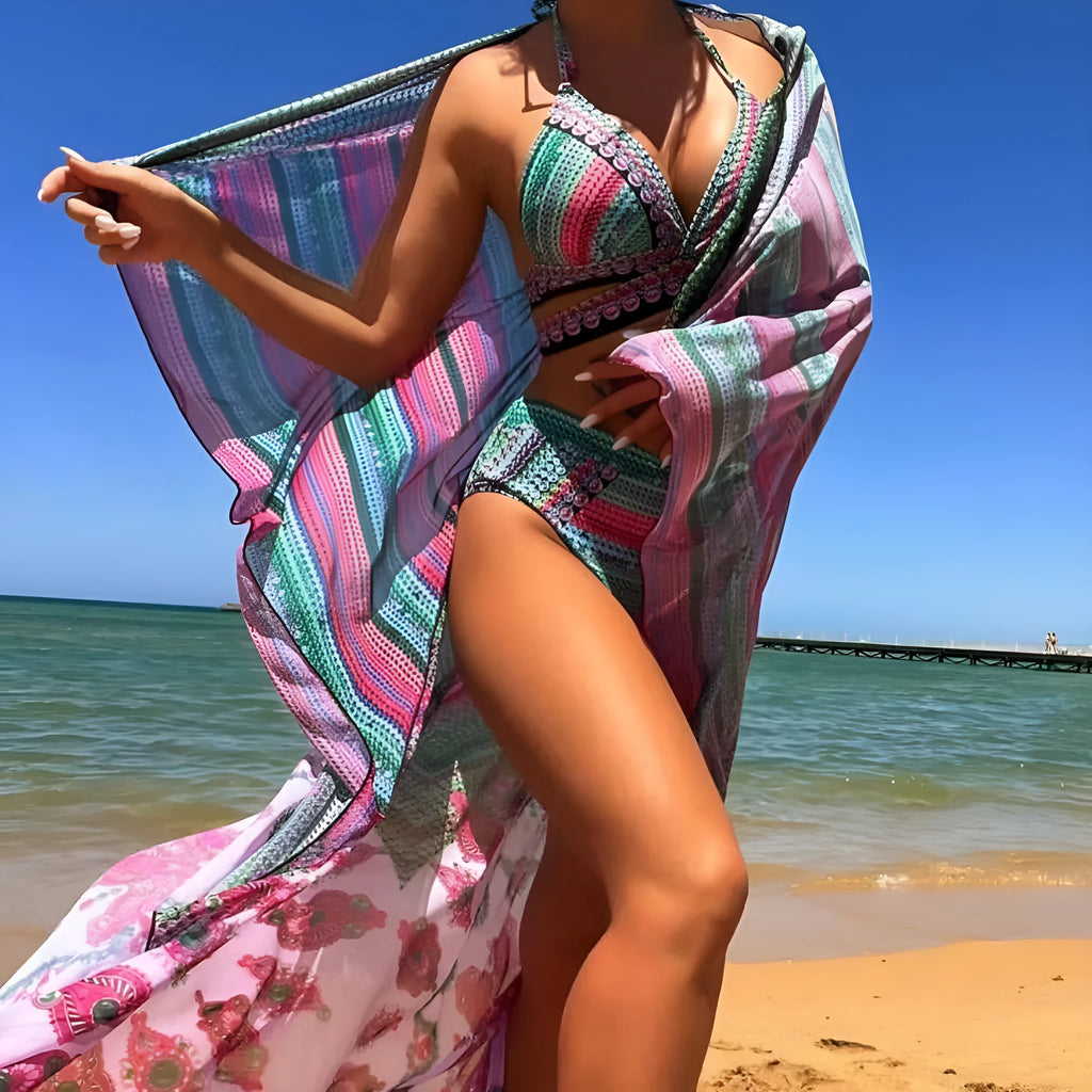 Women's three-piece bikini swimsuit with cross bandage bra, high waist briefs, and sheer mesh veils in multiple colour options