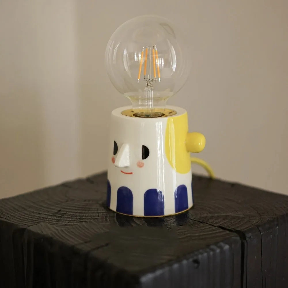 Handmade ceramic lamp with ball headlight design for bedside and decorative lighting