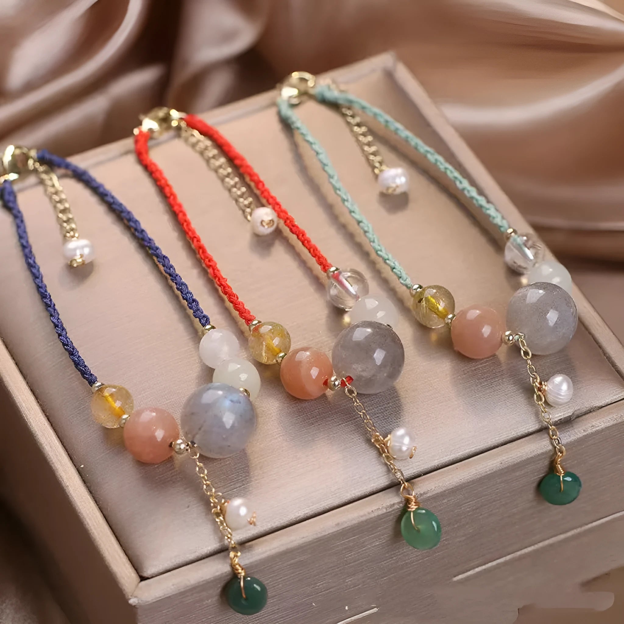 Hand-woven peace buckle bracelet with crystal and sequin details in red, green, and blue colour options for women