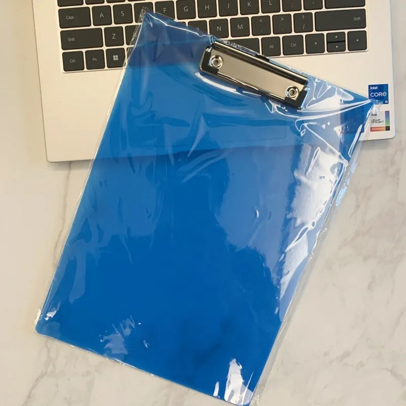Transparent plastic A4 plate holder with metal clip and integrated writing board surface, shown in blue.