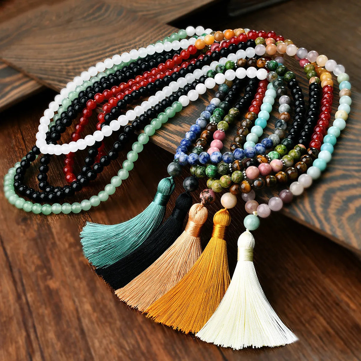 Handmade Bohemian long necklace with natural stone tassel and geometric mixed gem pendant.