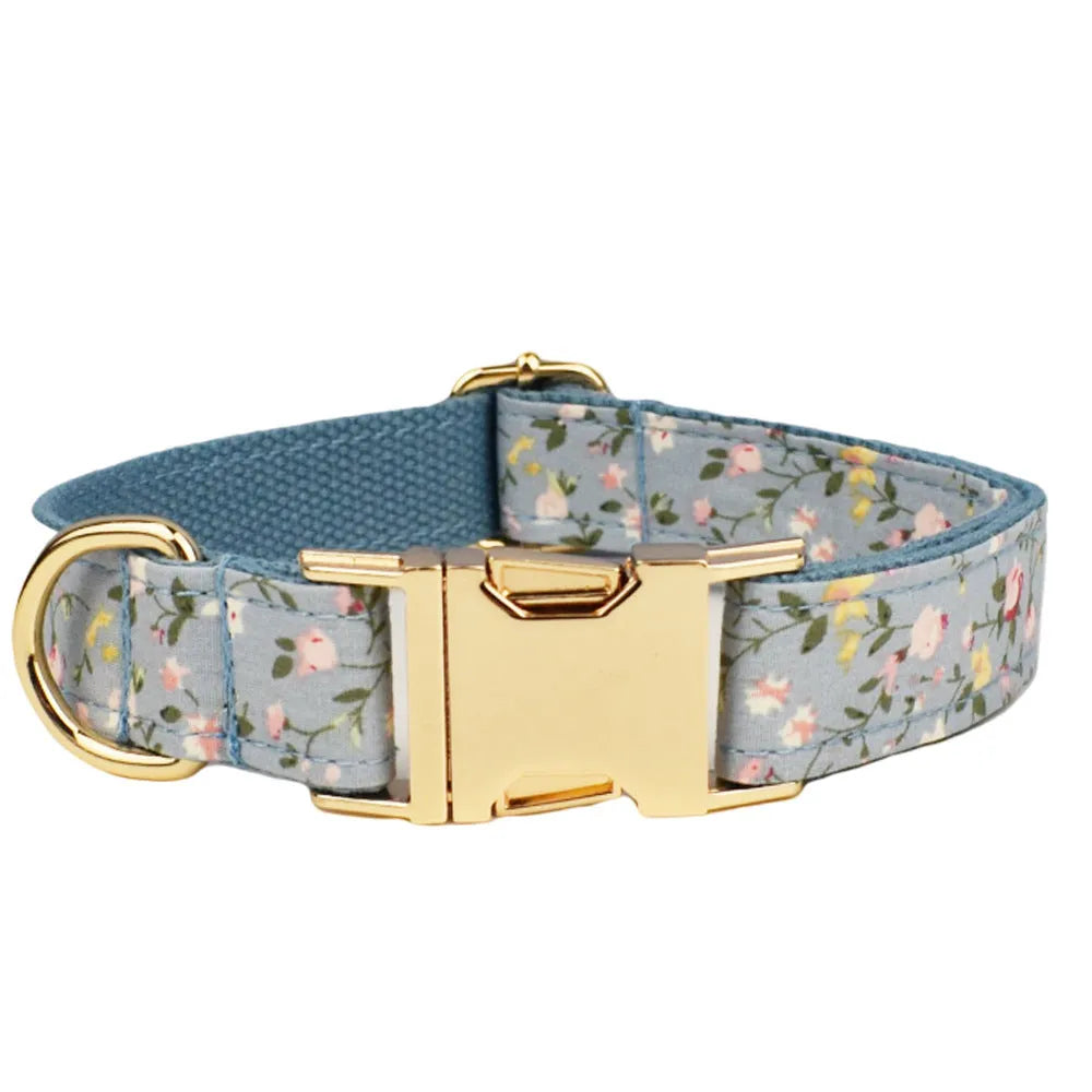 Blue floral polyester cotton dog collar and matching accessory set including leash, vest, bow tie, and waste bag