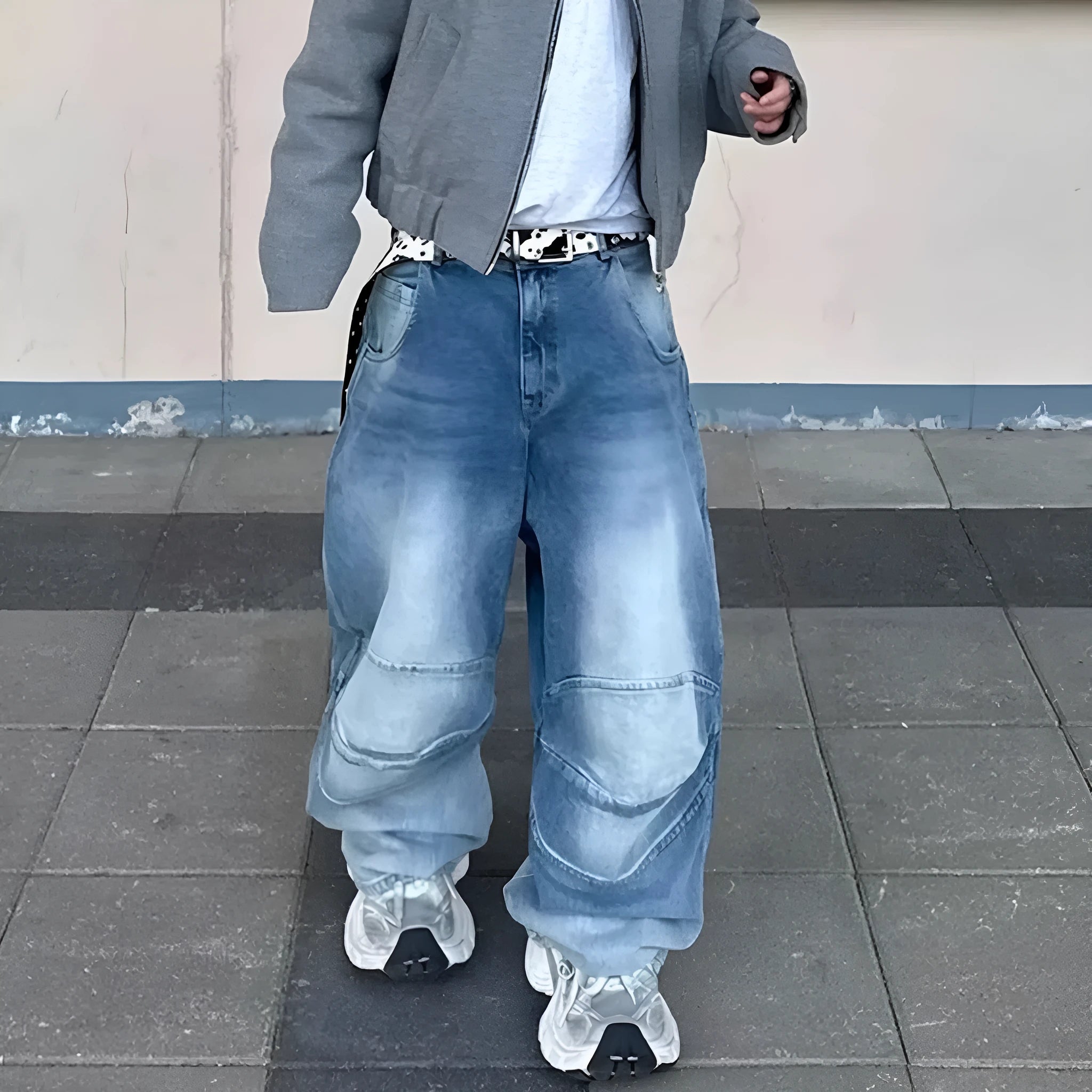 Profile Pleated baggy straight-leg washed white blue jeans on model