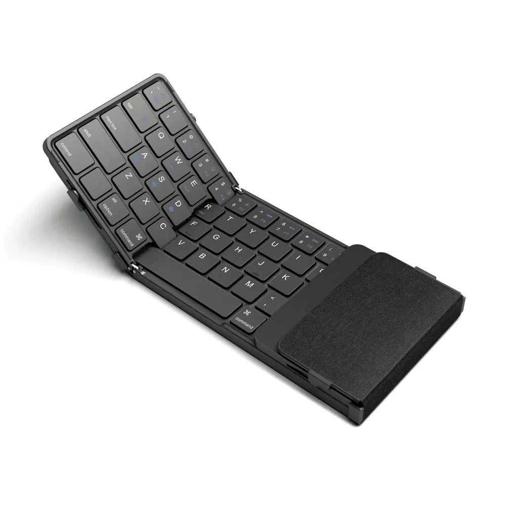 Black folding Bluetooth keyboard for mobile phones and tablets showing compact folded size