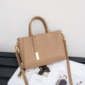 Portable genuine leather women handbag in soft cowhide with horizontal square shape and single strap, available in multiple colours