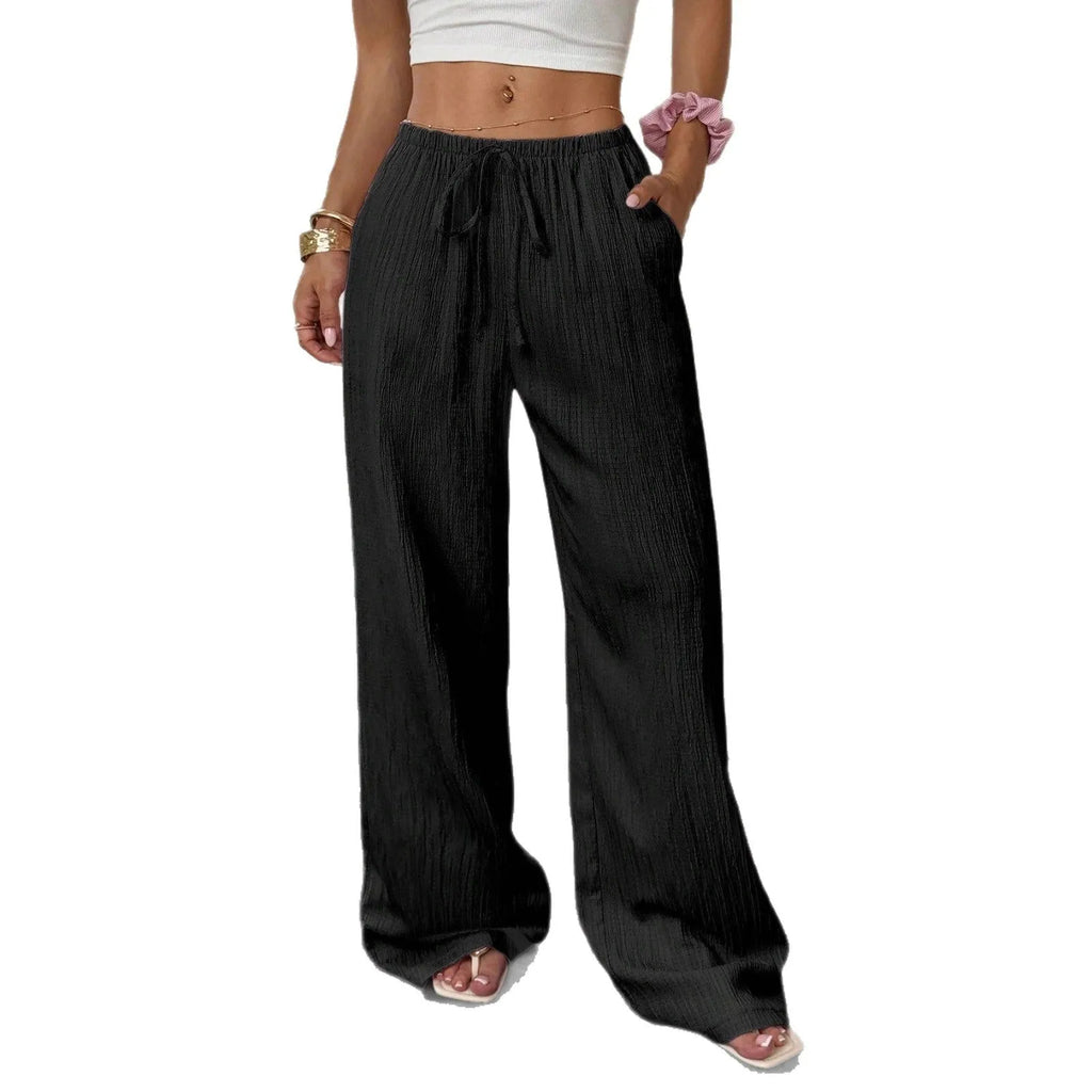 Women's black wide-leg trousers with lace-up waist detail on mid waist