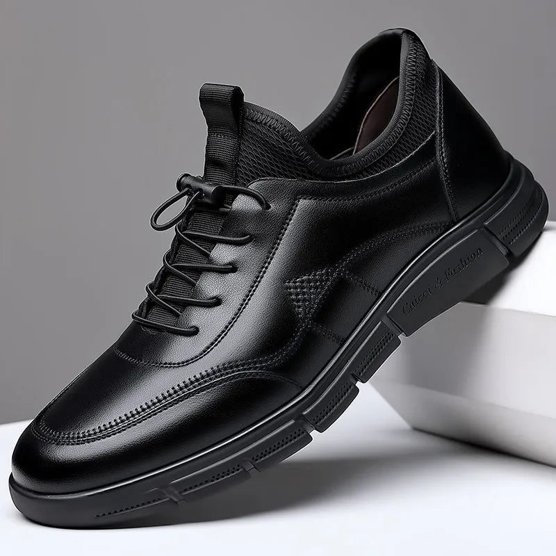 Men's black casual leather loafers with round toe, square heel, and slip-on design on a neutral background
