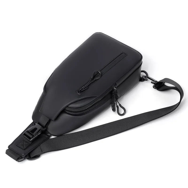 Black sling crossbody chest bag for men, simple city style, vertical square shape, zipper closure, soft surface, blue black grey