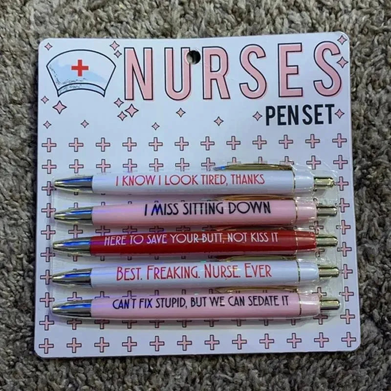 Set of five blue and pink nurse-themed retractable ballpoint pens on a white background.