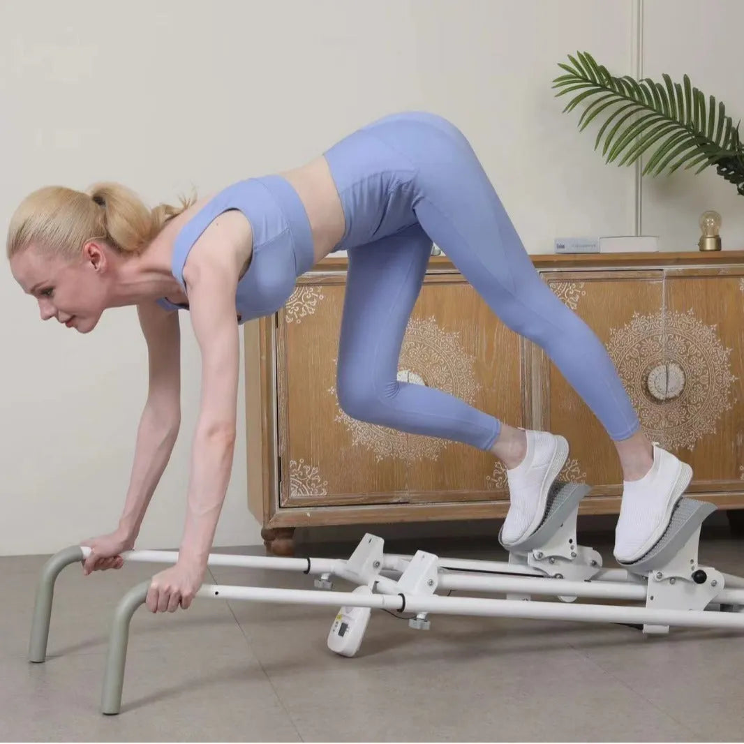 White foldable treadmill with attached climbing frame for home fitness