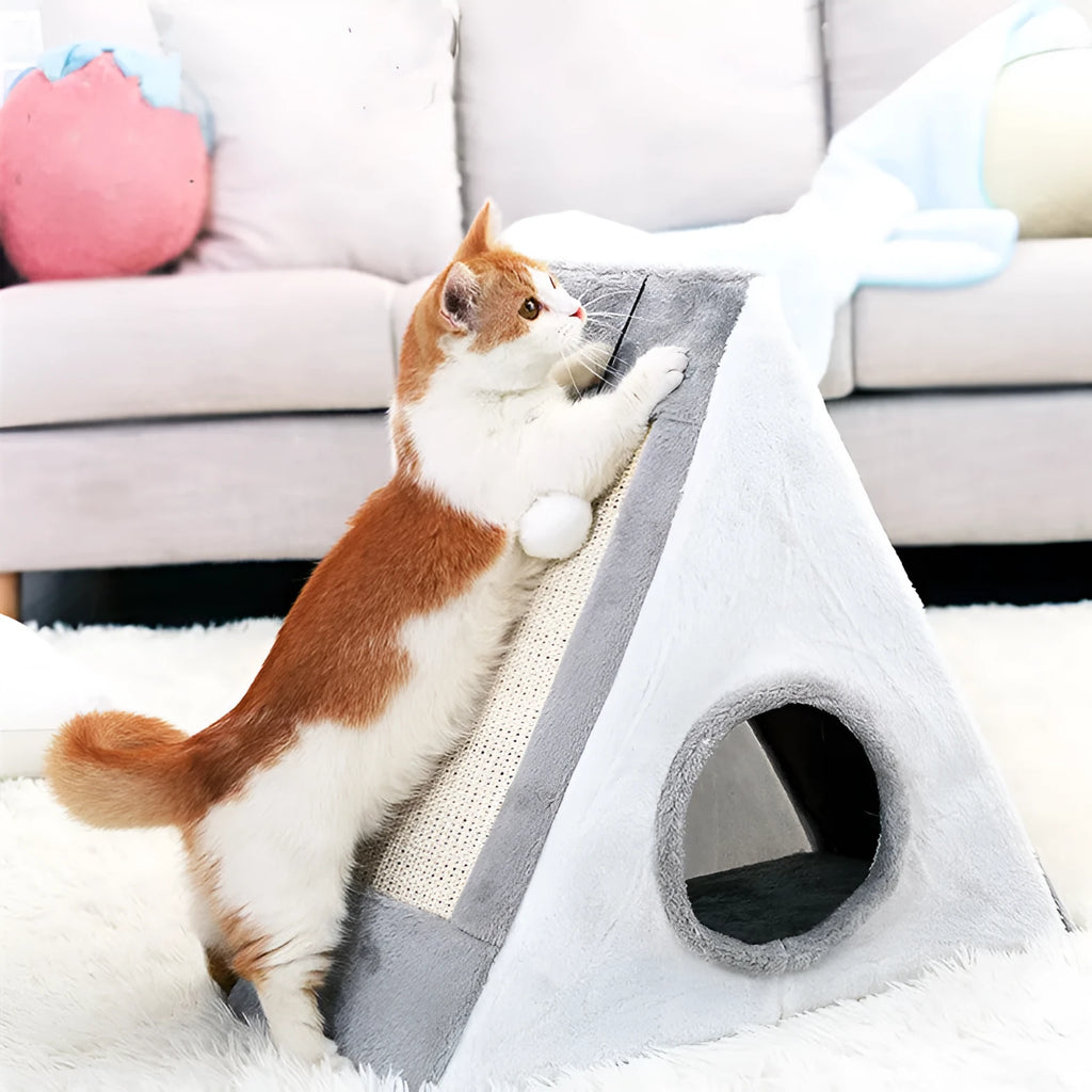 Triangular faux fur cat scratching post and bed platform in grey and white colours.